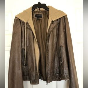 Bomber Jacket with sweater hoodie. Distressed leather